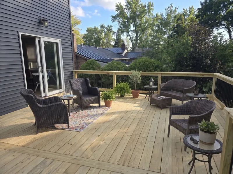 Design example: Pressure-treated wood deck with railing and patio furniture