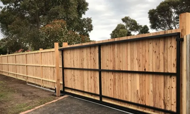 Cedar drive gate on a steel frame